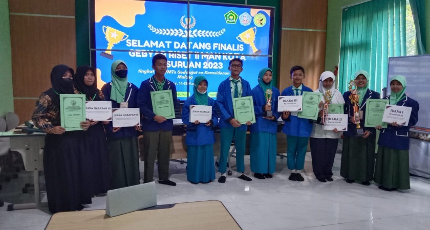 Juara 3 Kompetisi Karya Ilmiah, Tim Siswa KIR MTsN 6 Pasuruan berpartispasi dalam Gebyar Riset II MAN Kota Pasuruan